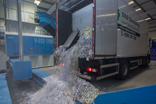 DGD Shredding mobile unit unloading shredded paper 
